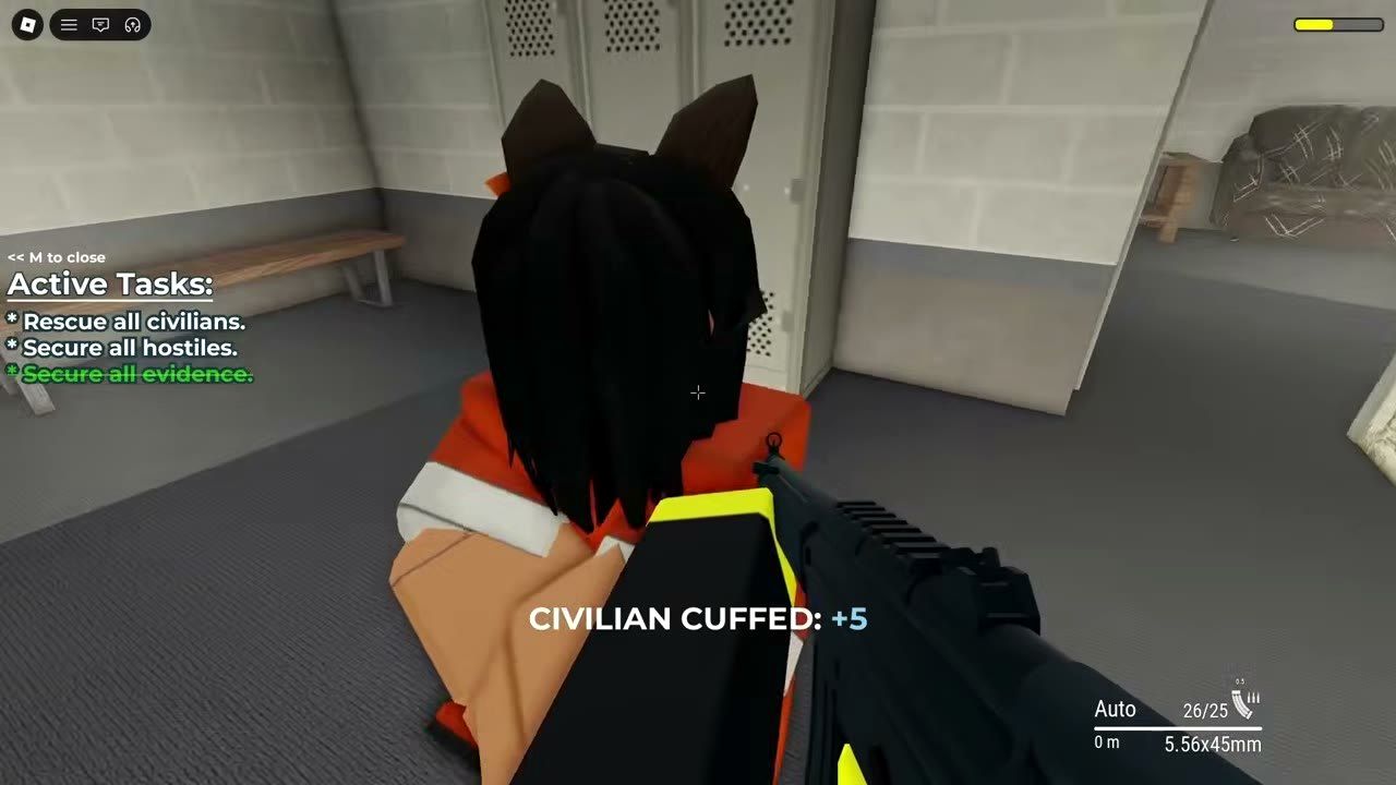 Officer covering a doorway in low light